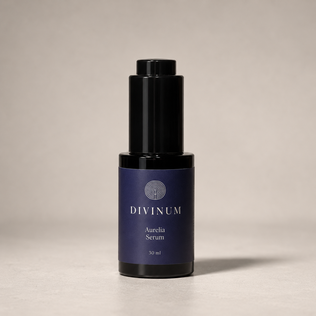 A 30 ml bottle of Divinum Aurelia Serum, featuring a dark purple label and a black dropper cap, set against a neutral light gray background.