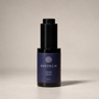 A 30 ml bottle of Divinum Aurelia Serum, featuring a dark purple label and a black dropper cap, set against a neutral light gray background.