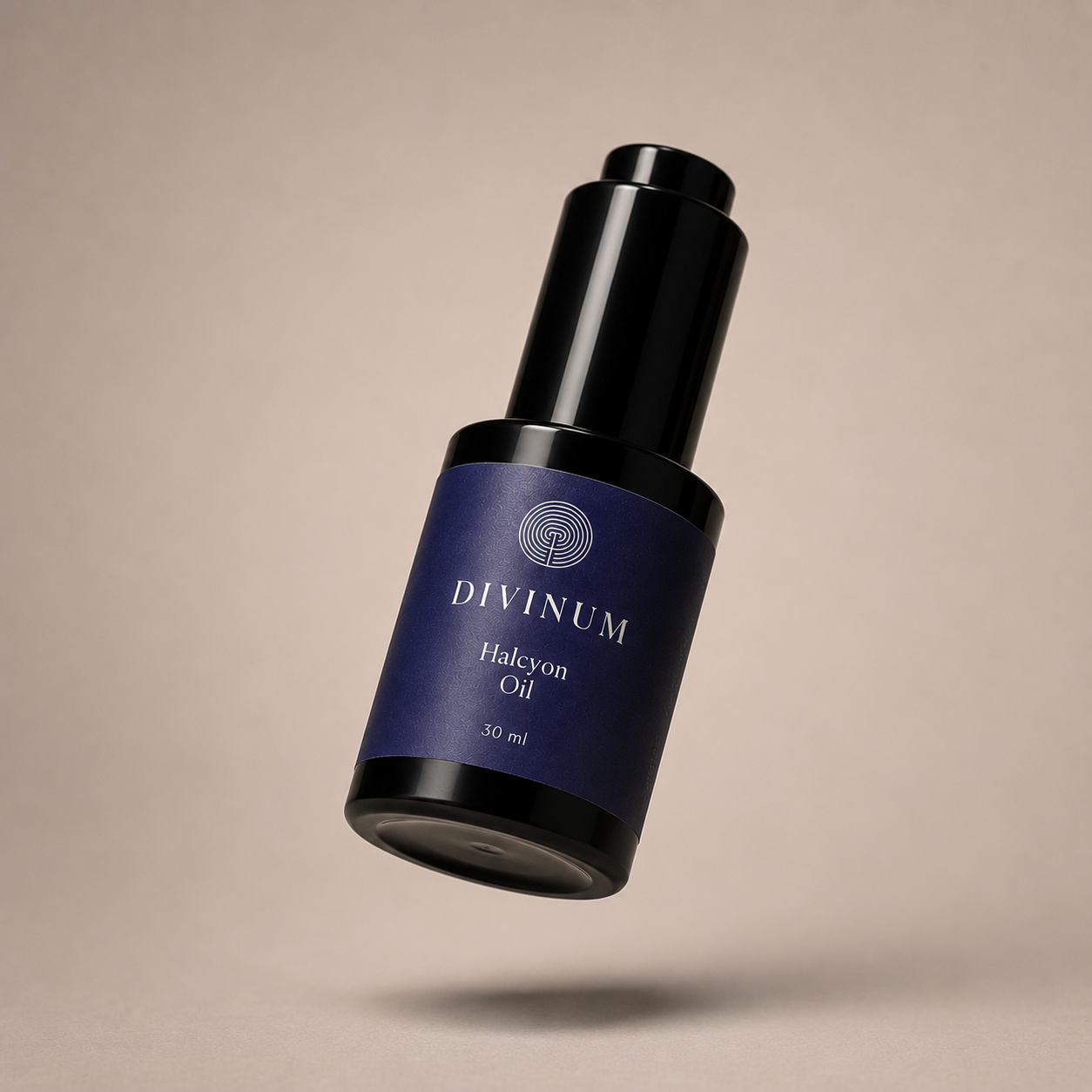 A bottle of Divinum Halcyon Oil floating against a solid beige background. The bottle is dark violet with a black cap and features the brand name 'DIVINUM' and product name 'Halcyon Oil' printed in stone on the label.