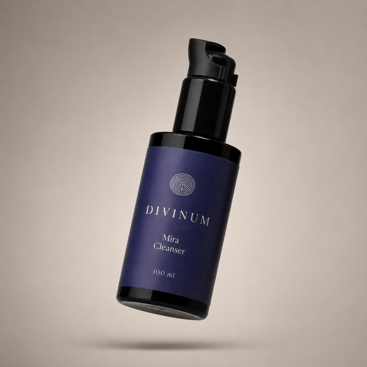 A 100 ml bottle of Divinum Mira Cleanser floating against a neutral beige background. The bottle is dark purple with a violet pump dispenser and features cream text and logo.